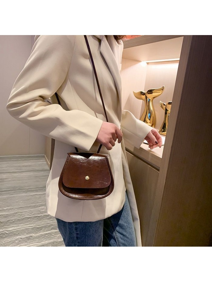 Women's bag new saddle button bag Korean women's shoulder bag fashion retro bag casual all-around solid color PU bag
